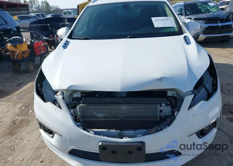 2018 Buick Envision Essence from USA, damaged, VIN LRBFX1SA4JD018107